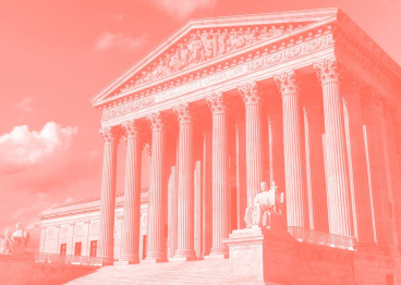 The United States Supreme Court Building at sunset in Washington DC, USA.